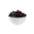 White bowl filled with dried blackberries on a white background