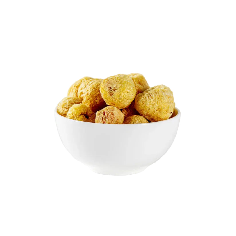 Freeze dried whole lychees in a white bowl