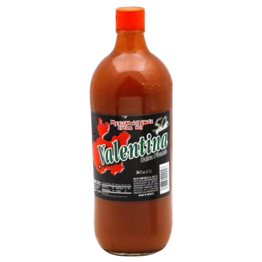 Bottle of Valentina hot sauce with a red cap on a white background