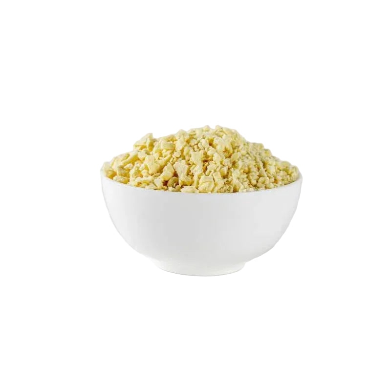 White bowl filled with yellow cheedar cheese crumb on a white background