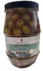 Jar of Penfield Food Co. jalapeno stuffed green olives on a white surface.